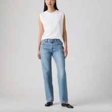 Load image into Gallery viewer, Person wearing a white sleeveless top and light blue jeans on a plain background