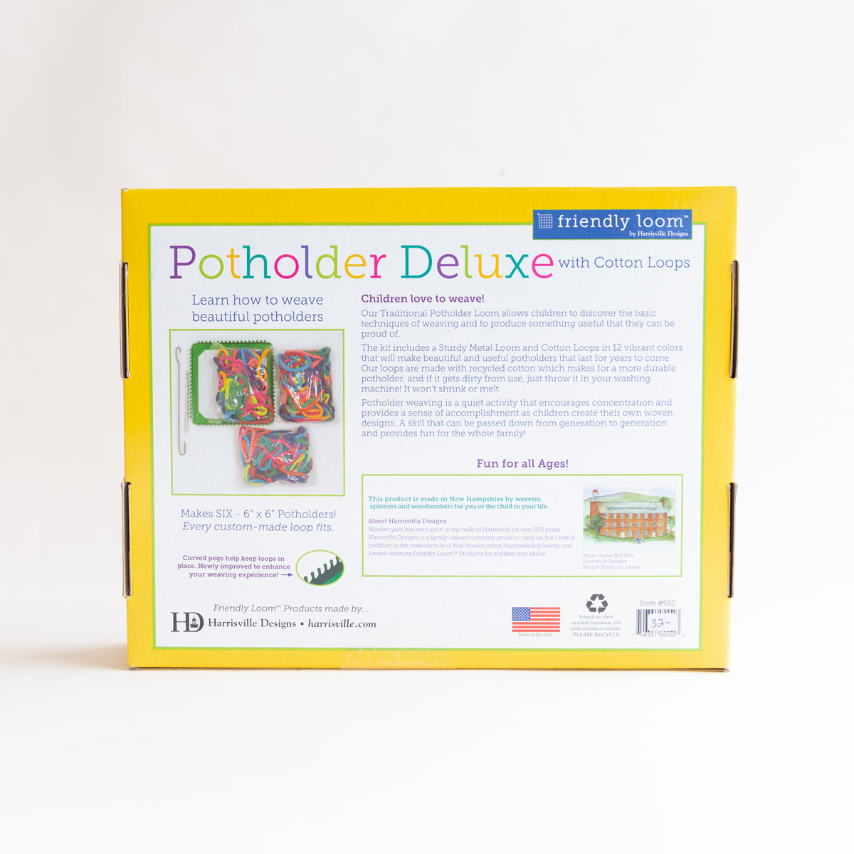 Back of the Harrisville Designs Friendly Loom Potholder Deluxe kit box showing product description, images of cotton loop bags and loom, and Made in USA and recycling badges