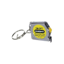 Load image into Gallery viewer, Side view of mini keychain tape measure.