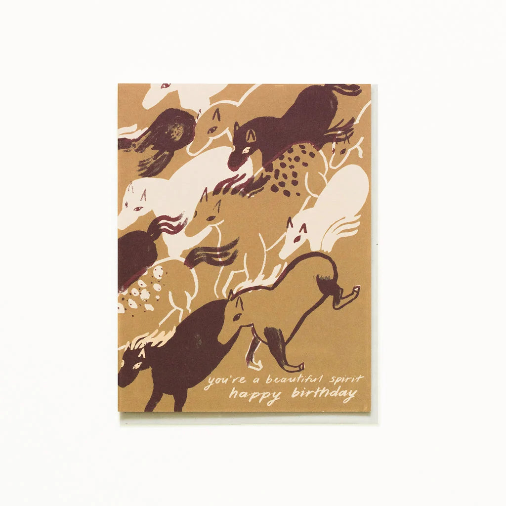 Small Adventure Horse Spirit Card, running horses in cream, tan, and dark brown, with the words “you're a beautiful spirit happy birthday.”
