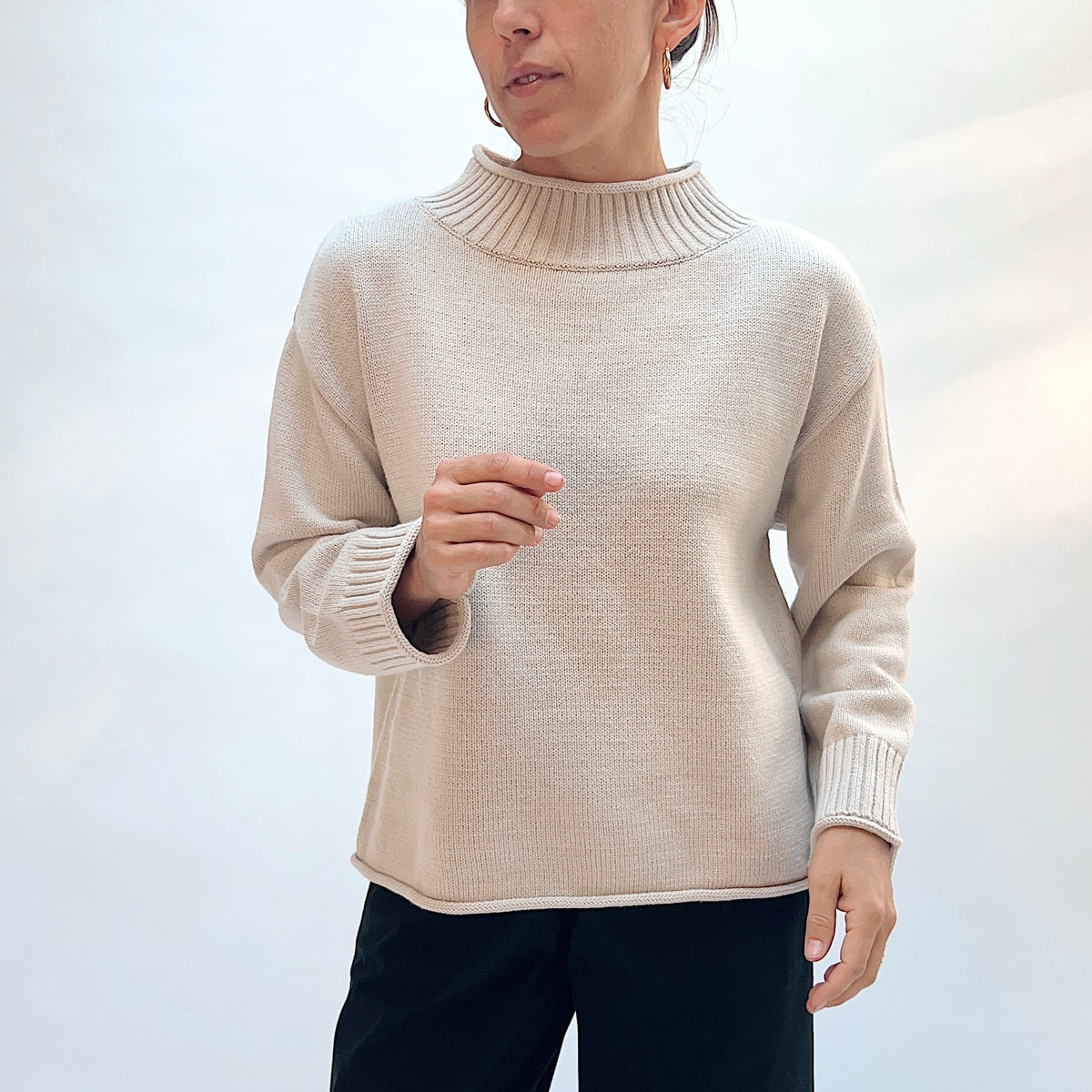 Habitat Fireside Cabin Sweater in Dove, front view showing the wide ribbed mock neck and deep ribbed cuffs in dove gray
