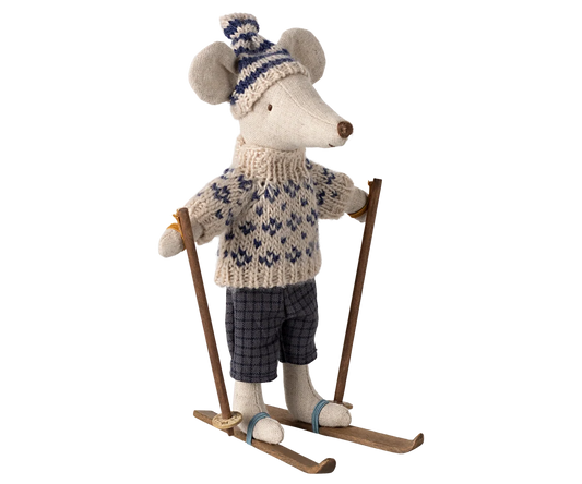 Maileg Winter Mouse Ski Dad — full front view of linen mouse doll wearing a striped knit pompom hat, cream and navy Fair Isle sweater, dark gingham shorts, and wooden skis with poles
