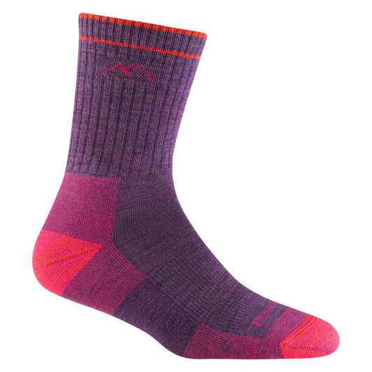 Purple and pink sock with mountain design on a white background