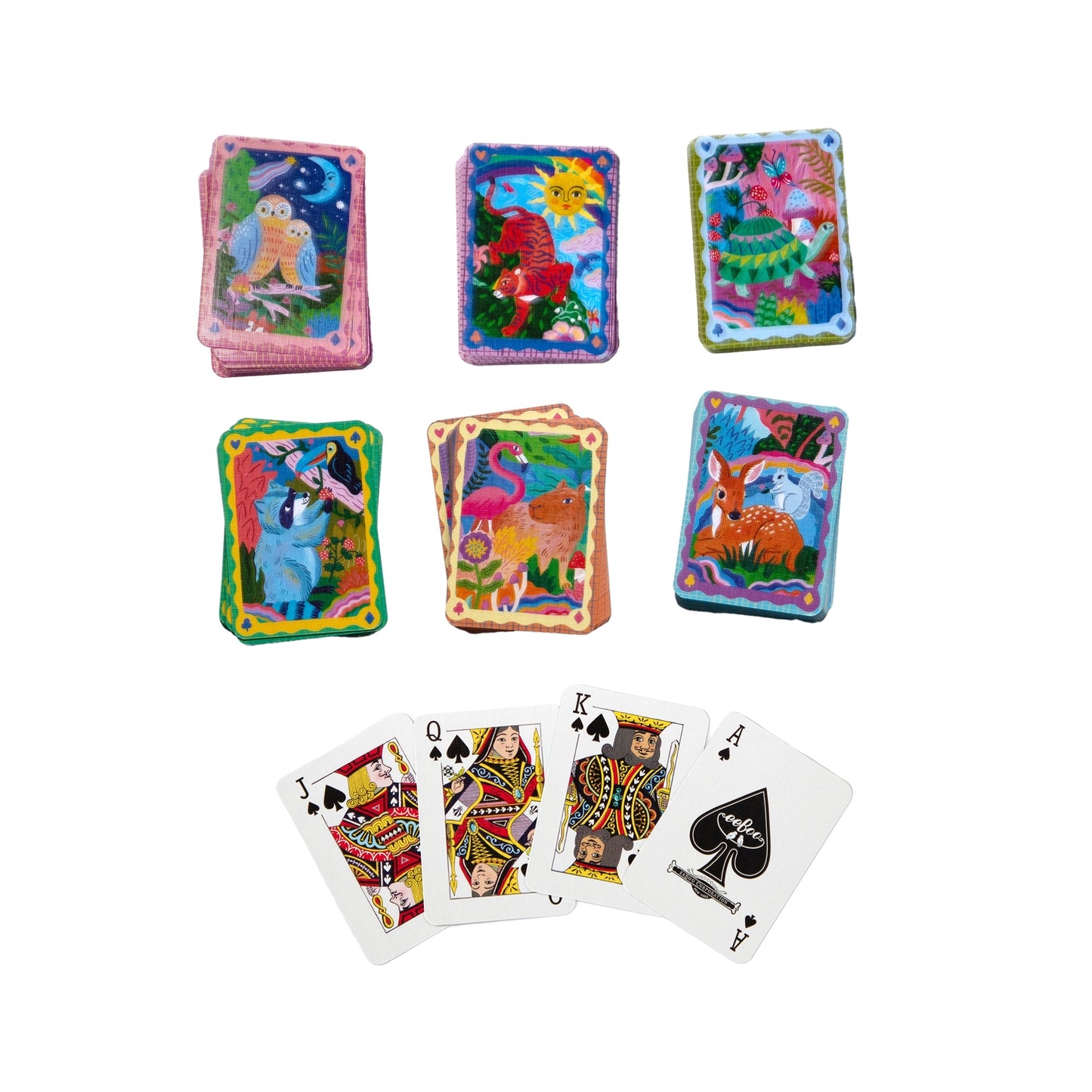 A set of illustrated playing cards with colorful fantasy artwork on the backs and five face cards fanned out below on a plain white background.