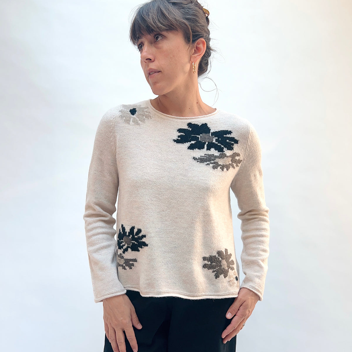 Habitat Cozy Bouquet Sweater in Dove Floral, front view showing the scoop neckline and scattered intarsia bouquet motifs in navy and taupe on dove
