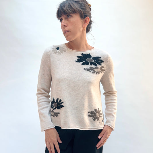 Habitat Cozy Bouquet Sweater in Dove Floral, front view showing the scoop neckline and scattered intarsia bouquet motifs in navy and taupe on dove
