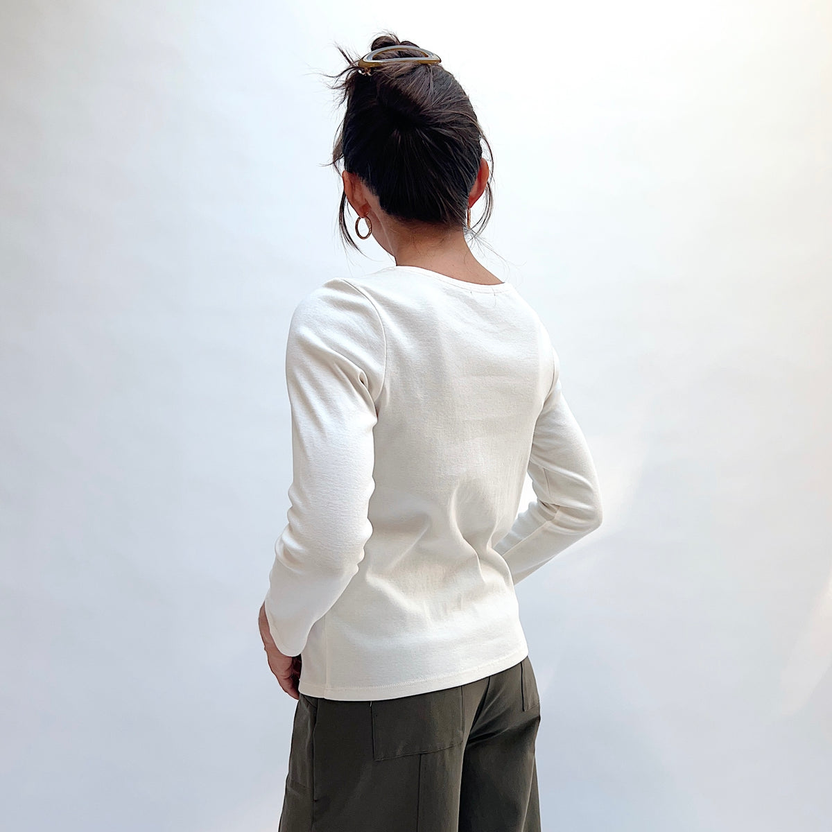 Habitat Rib Everyday Tee in Winter White, back view showing the fitted ribbed silhouette and 3/4 sleeve length

