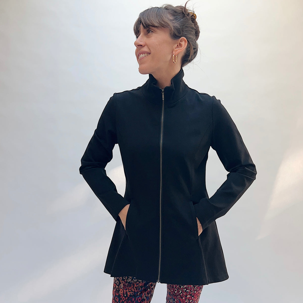 Habitat Luxe Ponte Soho Jacket in Black, front view showing the zip-front closure, stand collar, princess seams, and A-line silhouette
