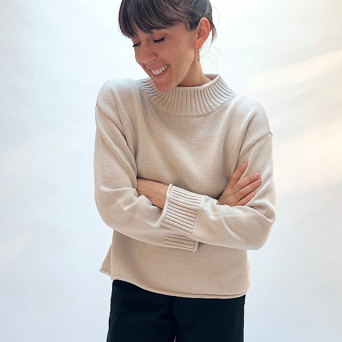 Habitat Fireside Cabin Sweater in Dove, front view showing the mock neck collar and deep ribbed cuff detail in dove gray
