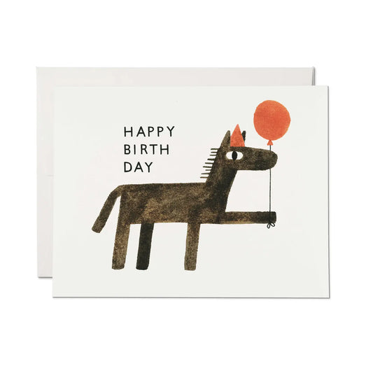 Birthday card with a horse illustration and red balloon on a white background