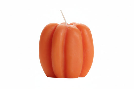 Big Dipper Wax Works Medium Beeswax Pumpkin Candle in light orange, unlit product shot against a white background, showing a tall upright ribbed pumpkin form with a short wick at the top 
