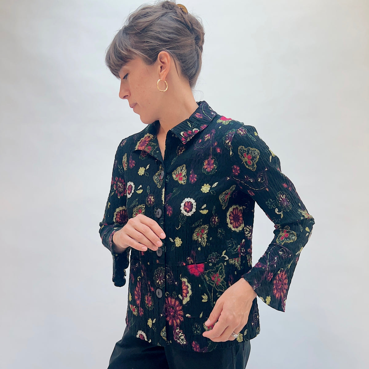 Habitat Floral Crinkle Cotton Flounce Shirt in Black, side view showing the point collar, flounce sleeves, and multicolor floral and paisley print
