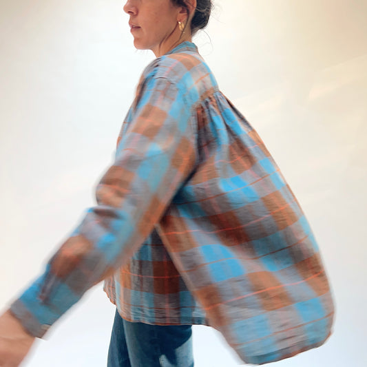 Ichi Antiquités Woven Plaid Check Shirt in Blue, side view in motion showing the long sleeve and flowing back.
