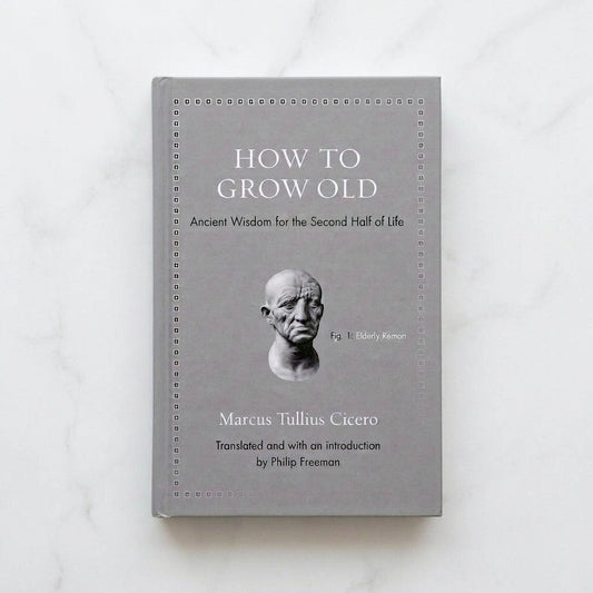 Gray cover of How to Grow Old by Marcus Tullius Cicero, translated by Philip Freeman, featuring a sculpted bust of an elderly Roman.
