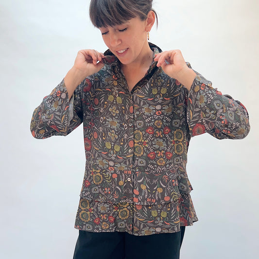 Habitat Crepe Garden Flounce Shirt in Olive, front view showing the point collar, button-front closure, and dense garden floral print
