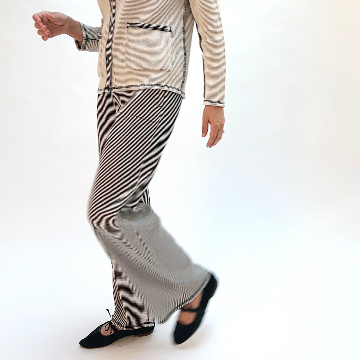Habitat Opposites Attract Pant in Winter White, side view showing the wide-leg silhouette and cropped hem in fine stripe thermal knit
