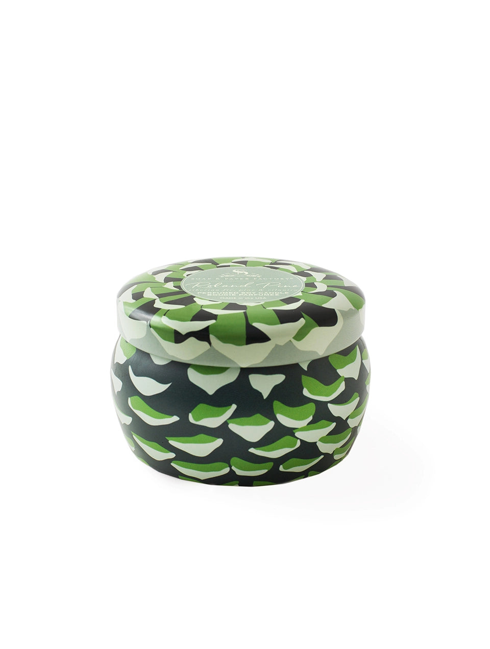 Closed Roland Pine small soy candle tin with a green and cream patterned lid, shown against a white background.
