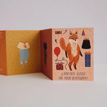 Load image into Gallery viewer, Open birthday card with fox illustration and text on a white background
