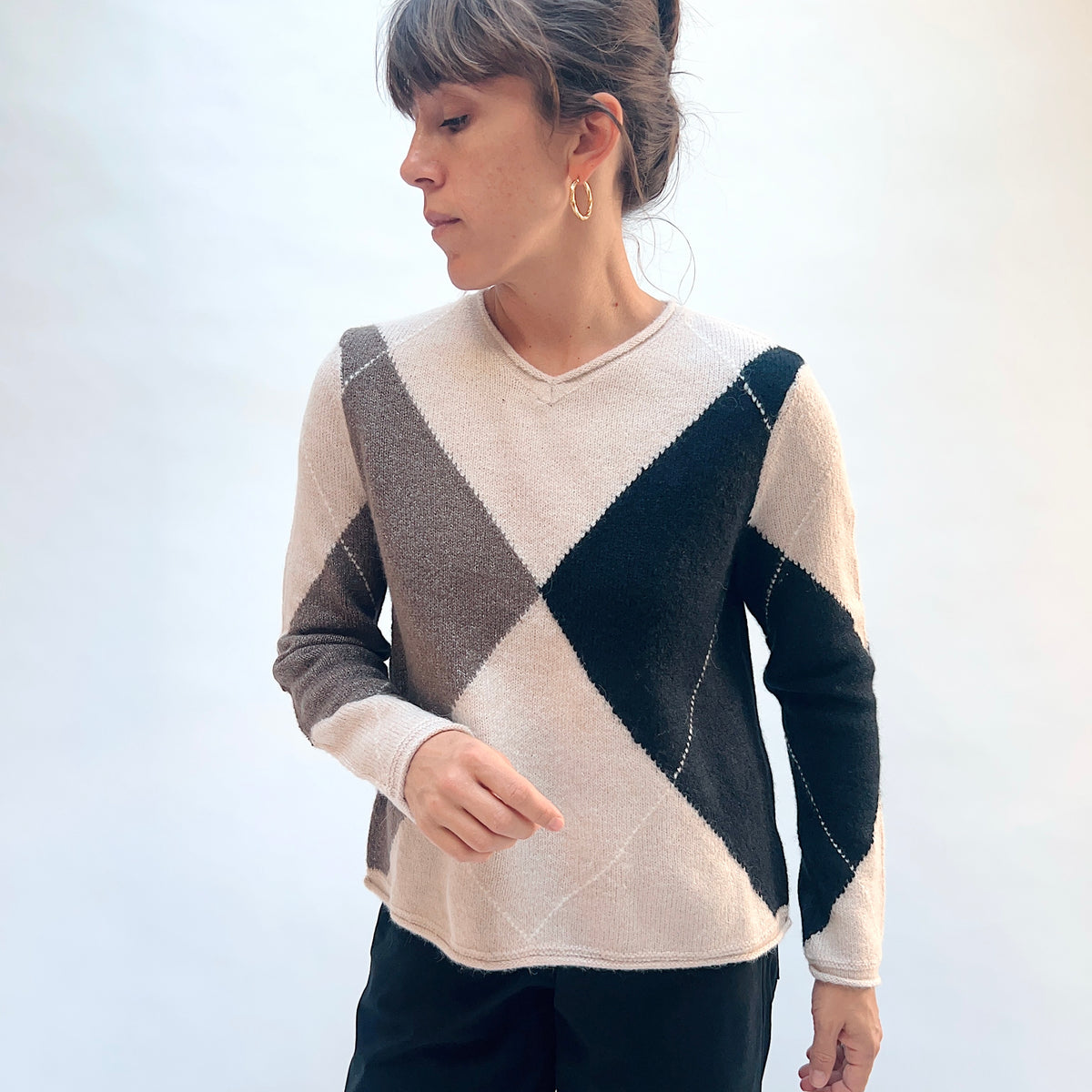 Habitat Alpine Argyle Pullover in Dove, front view showing the V-neckline and large-scale argyle pattern in navy and taupe on dove
