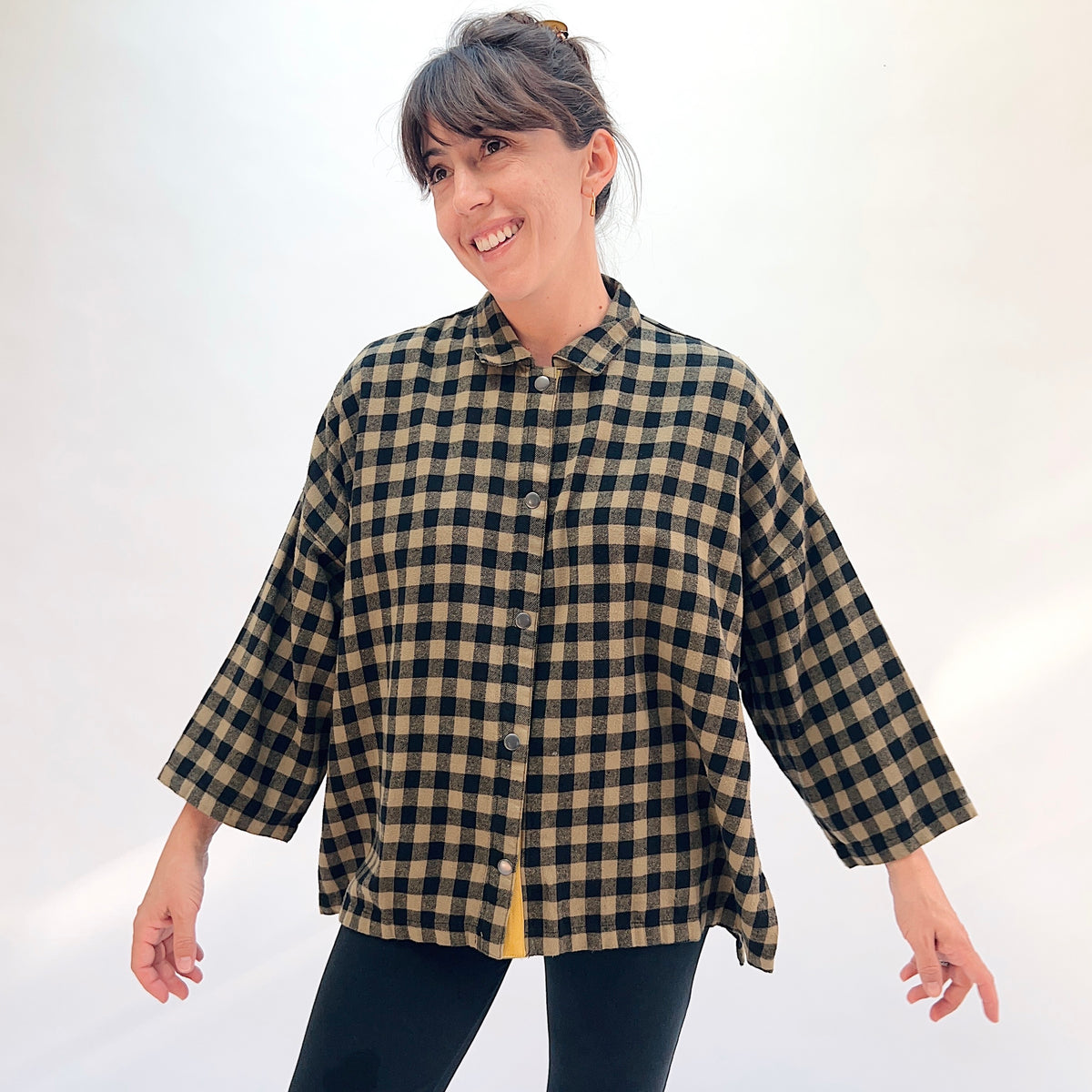 Eleven Stitch Big Check Big Shirt in Olive, front view showing the boxy oversized silhouette in olive and black gingham check flannel with point collar, mustard contrast placket, and chest patch pocket
