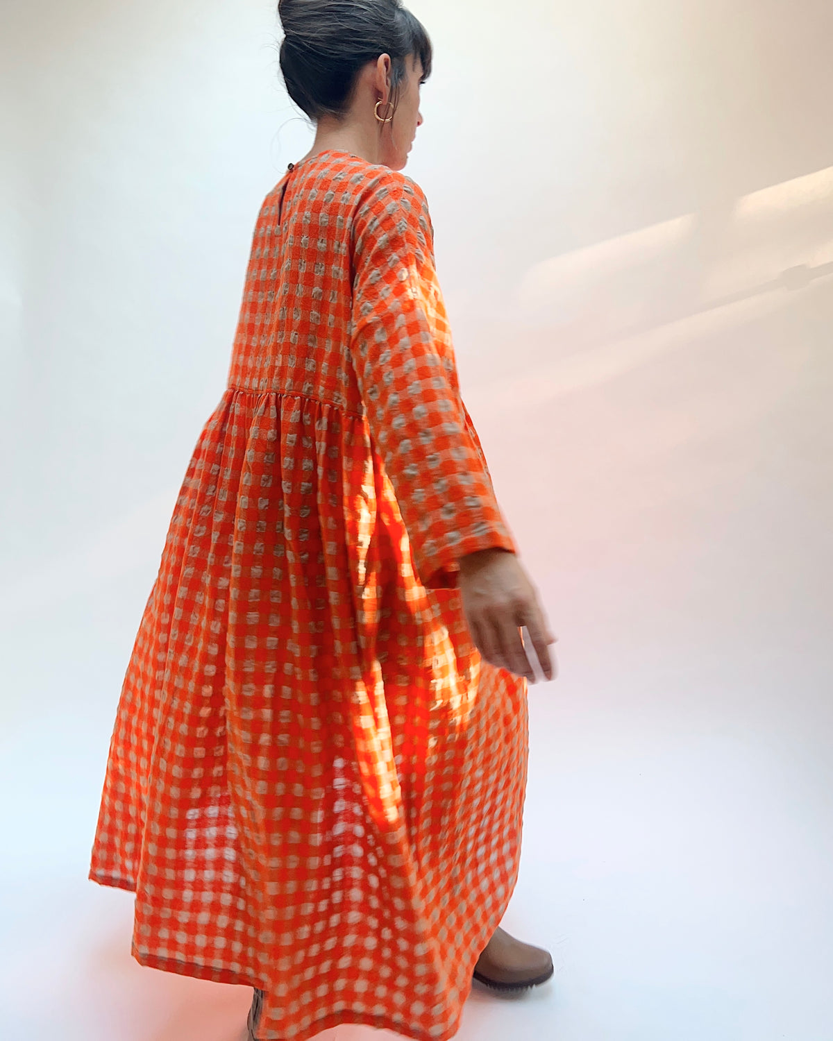 Ichi Antiquités Gingham Wool Check Dress in Beige & Orange, back three-quarter view showing the long sleeves and gathered waist detail
