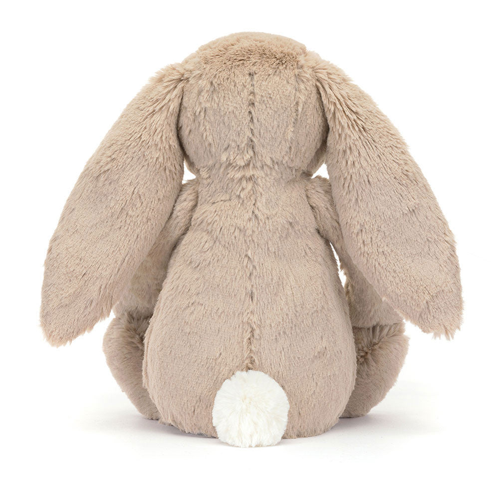 Jellycat Blossom Beige Bunny 'Petal' Original — rear view showing the beige textured fur, wide floppy ears, and small white cotton tail, on a white background