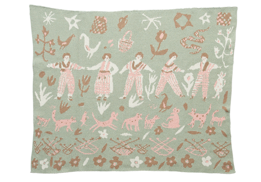 Forest Friends Sky child blanket laid flat, with pink figures and animals, white birds, and brown baskets on pale green.
