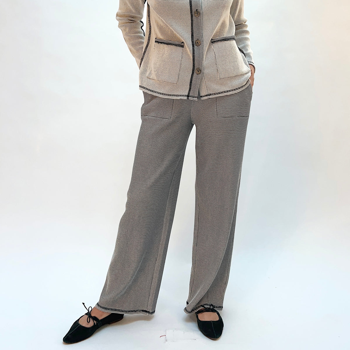 Habitat Opposites Attract Pant in Winter White, front view showing the elastic waistband and wide-leg cut in fine stripe thermal knit
