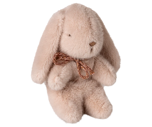 Plush bunny toy with a gold bow on a white background