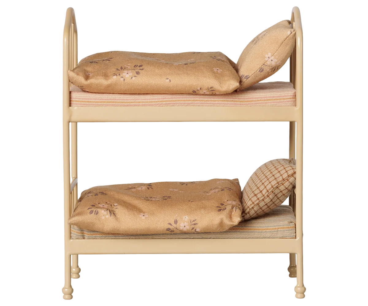 Maileg Bunk Bed in Wheat — front view of miniature metal bunk bed in warm wheat finish with two floral cotton mattresses, two soft blankets, and two pillows — one floral, one gingham check
