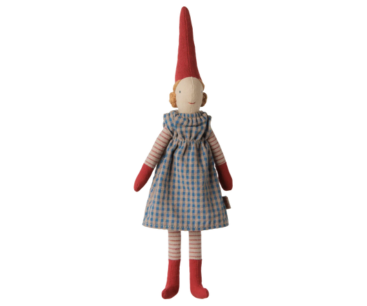 Maileg Pixy Girl, size 1, in a blue checkered dress, striped sleeves and legs, red mittens and socks, and a tall red hat.

