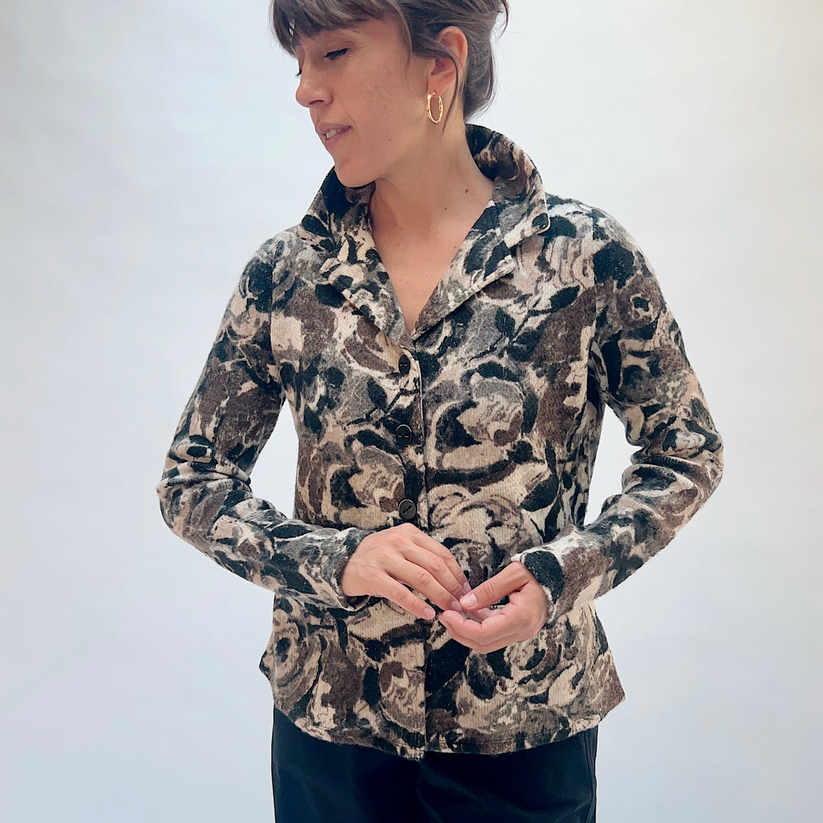 Habitat Aspen Peplum Jacket in Black, front view showing the notch lapel collar, button-front closure, and abstract floral print in black, taupe, and cream
