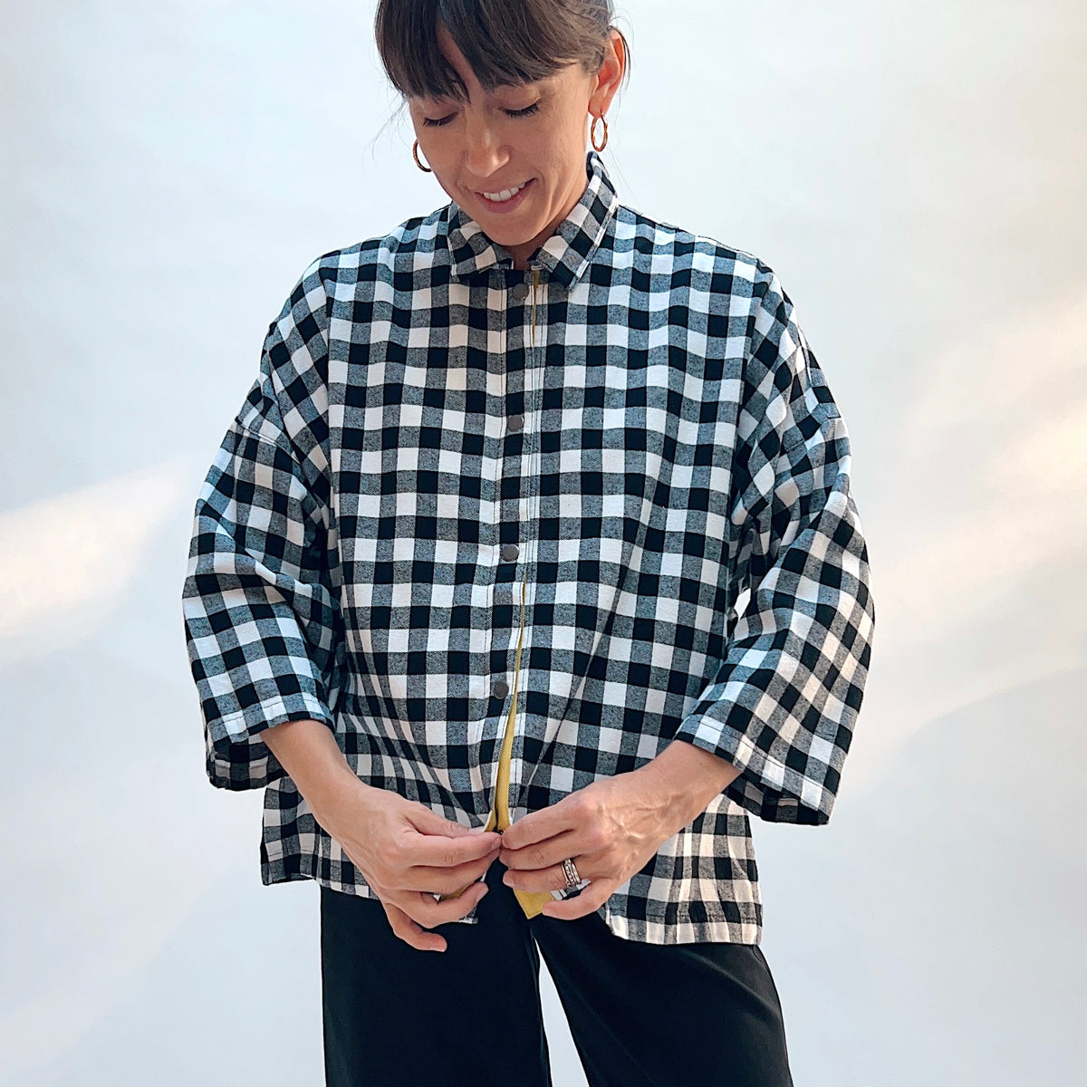 Eleven Stitch Big Check Big Shirt in Black & White, front view showing the point collar and mustard contrast placket detail in large black and white gingham check cotton flannel
