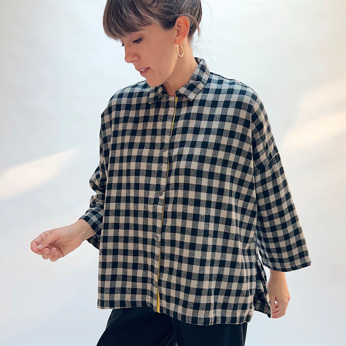 Eleven Stitch Big Check Big Shirt in Fennel, front three-quarter view showing the boxy oversized fit and mustard contrast placket in large fennel gingham check cotton flannel
