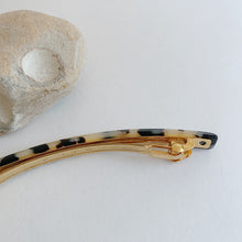 Load image into Gallery viewer, ivory tokyo skinny barrette laydown side view with prop
