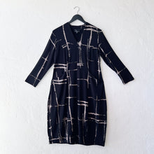 Load image into Gallery viewer, Olivia by Habitat | Arthouse Grid Cocoon Dress in Black

