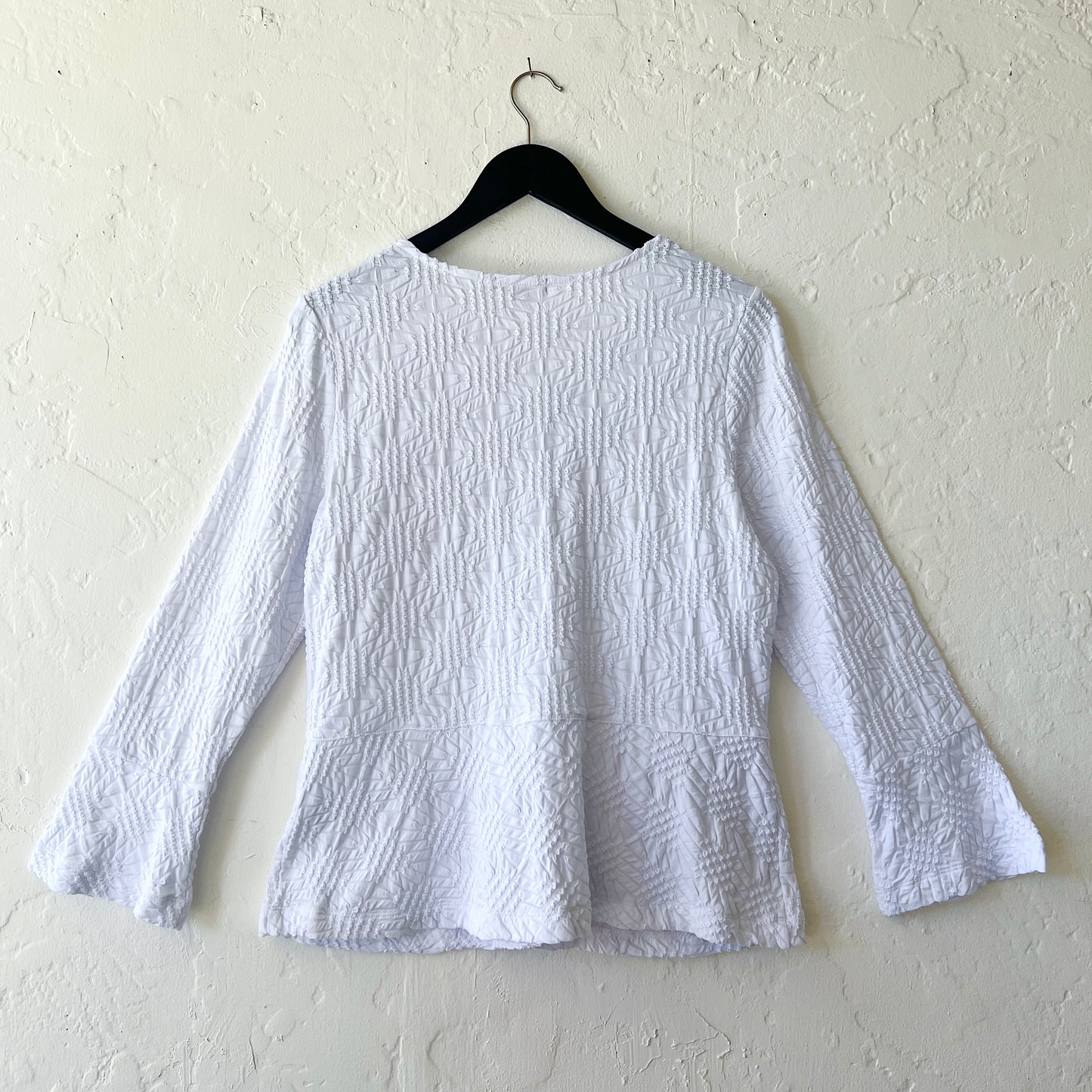 Sunburst Knit Peplum Swing Jacket in White