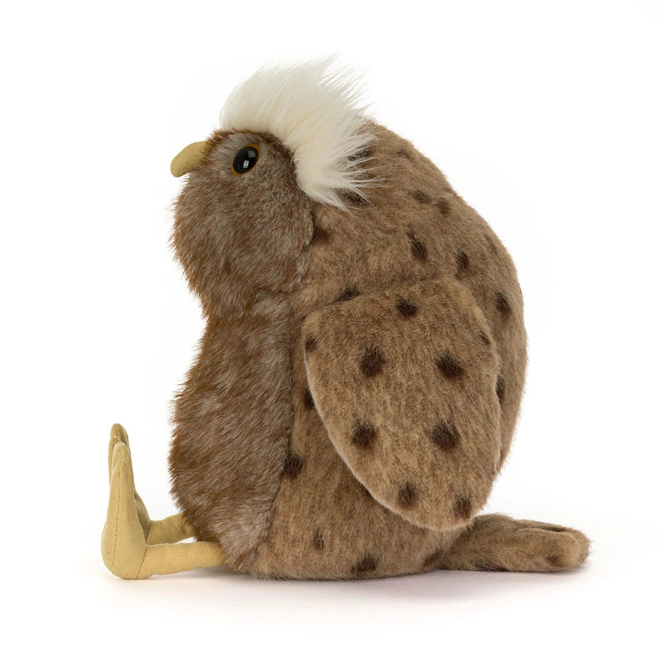 Jellycat Tawoola Owl, side view showing the spotted wing, fluffy cream crown, and short tail.
