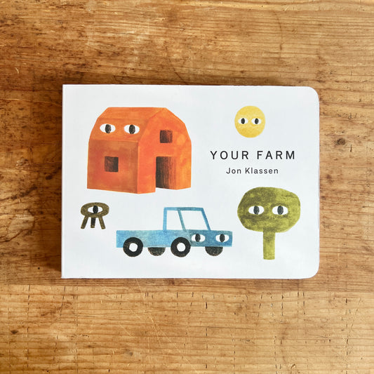 Cover of Your Farm by Jon Klassen, showing an orange barn, yellow sun, blue truck, green tree, and stool, each with eyes.
