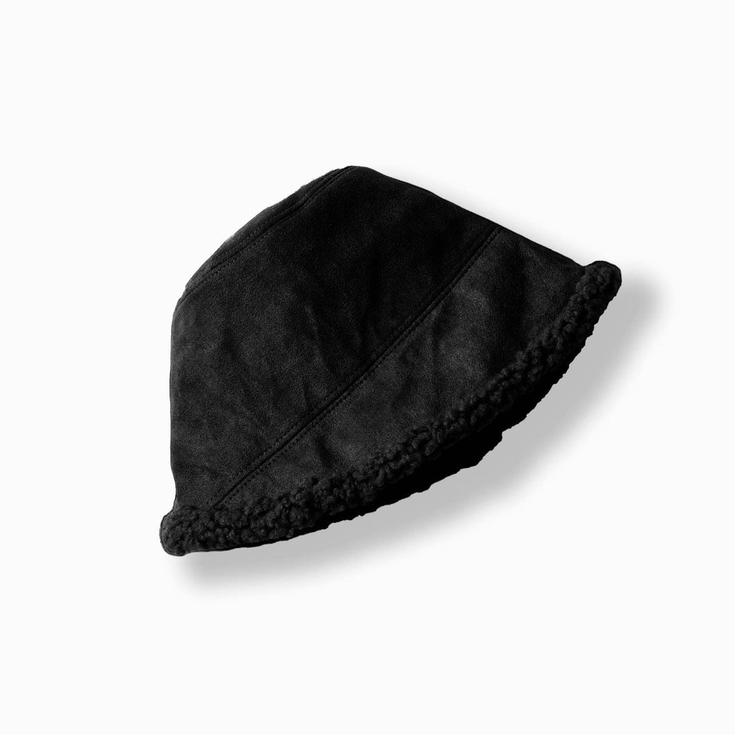 Black bucket hat on a white background