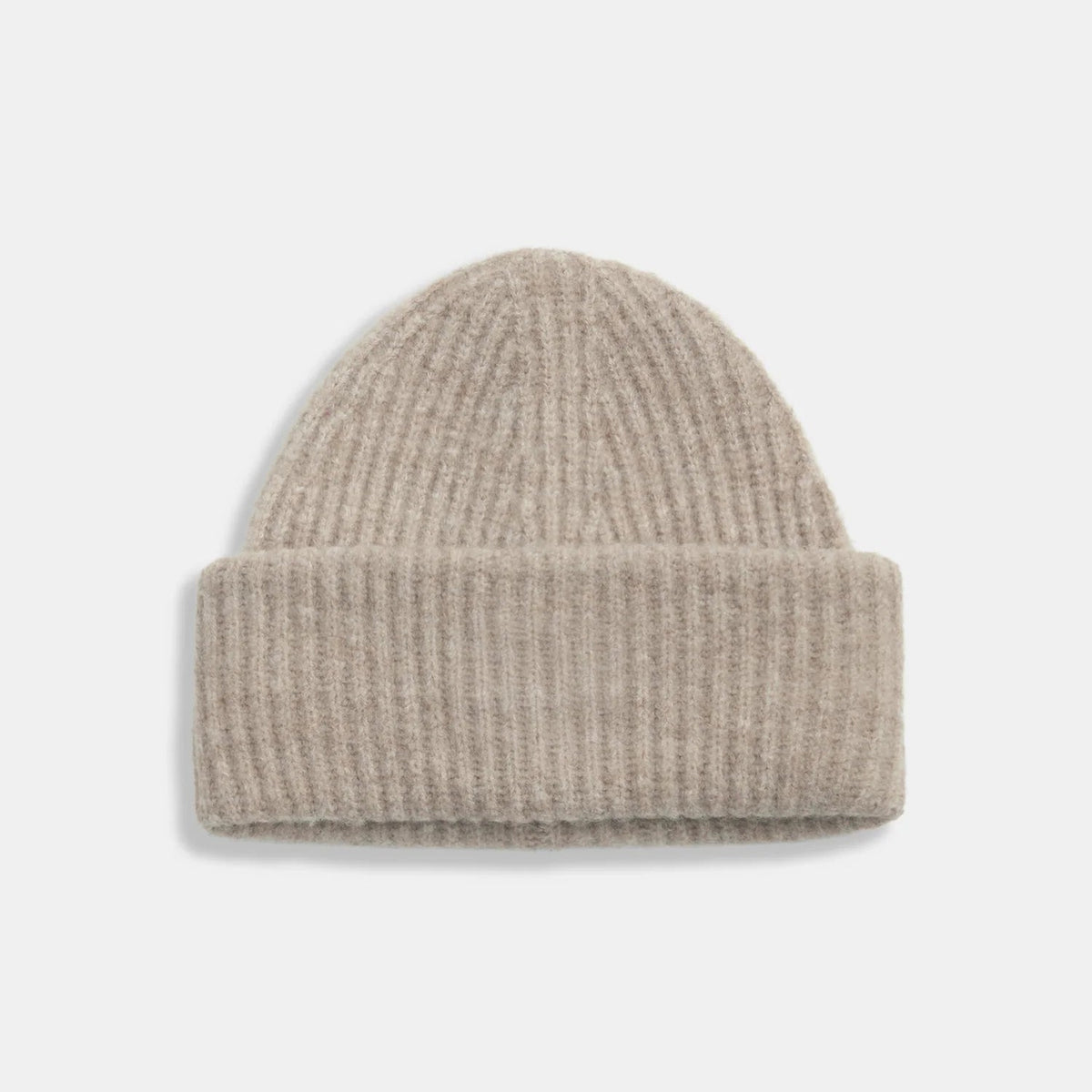 Taupe ribbed knit beanie laid flat with a rounded crown and wide fold-over cuff.

