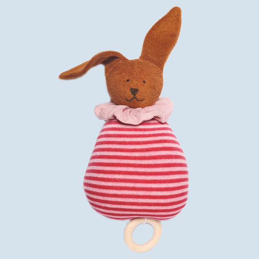 Brown plush bunny toy music box with a pink striped body and wooden ring on a light blue background