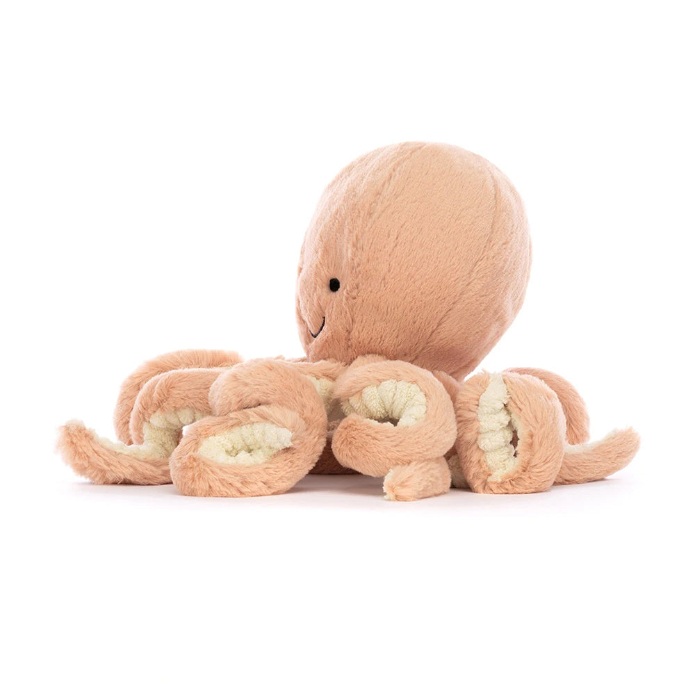 Jellycat Little Odell Octopus, side view showing the rounded head and curled arms with cream undersides.
