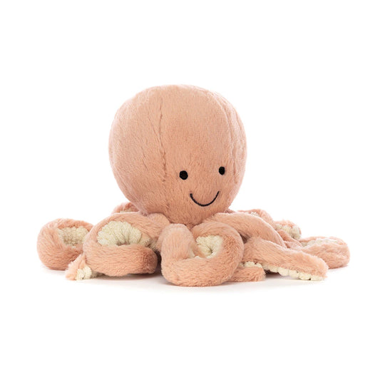Jellycat Little Odell Octopus, angled front view showing peach-pink plush, embroidered eyes, a stitched smile, and curled arms.
