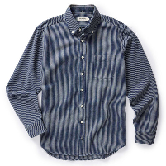Flat lay of The Jack in Roped Indigo by Taylor Stitch — a long-sleeve button-down Oxford shirt in navy roped indigo with a chest pocket and button-down collar, on a white background
