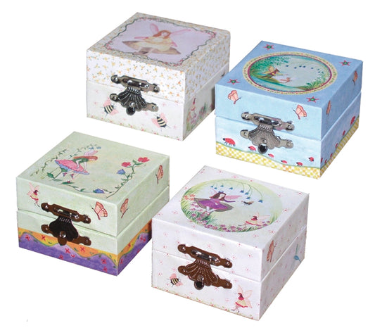 Set of four decorative jewelry boxes with fairy designs on a white background