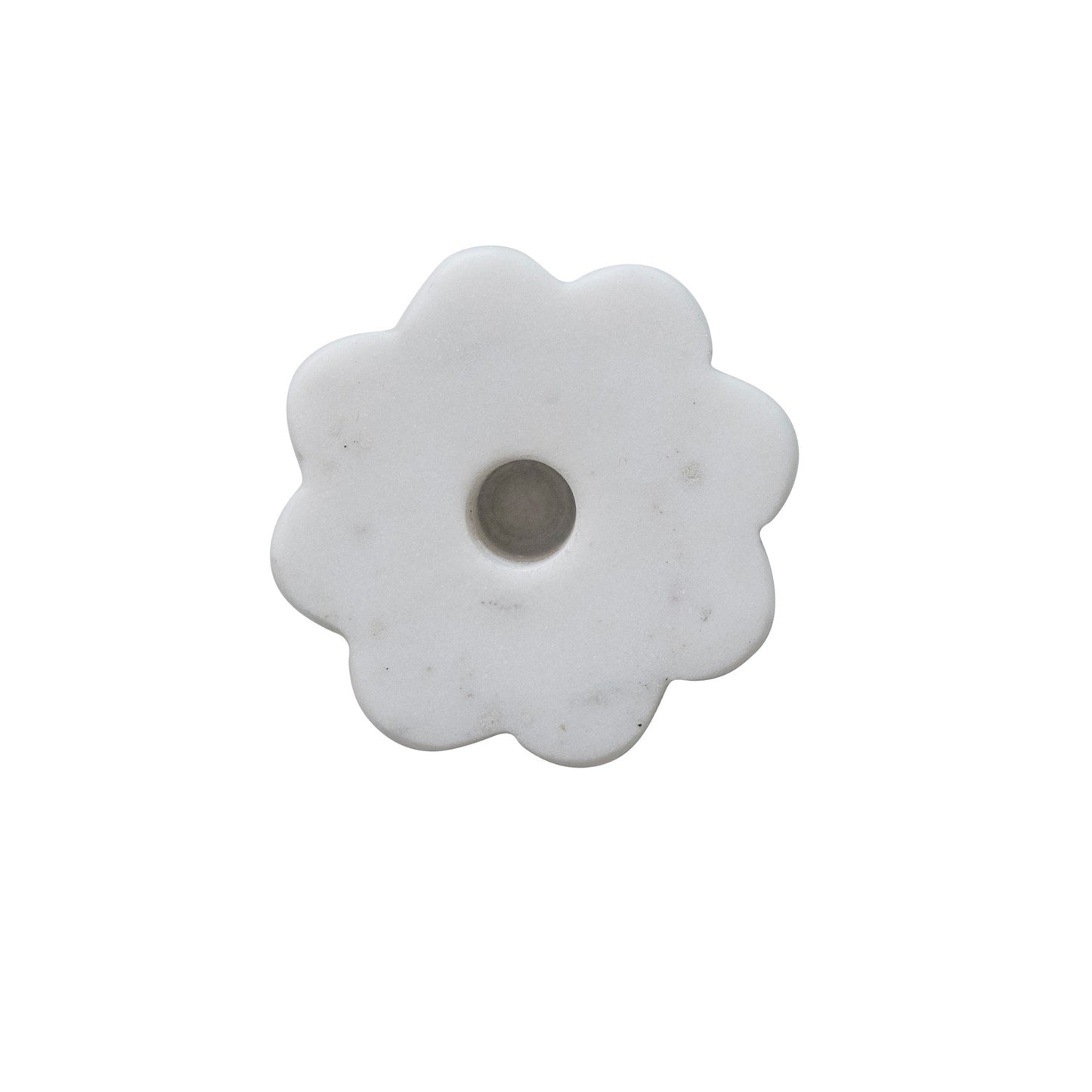 White marble flower-shaped candle holder on a white background