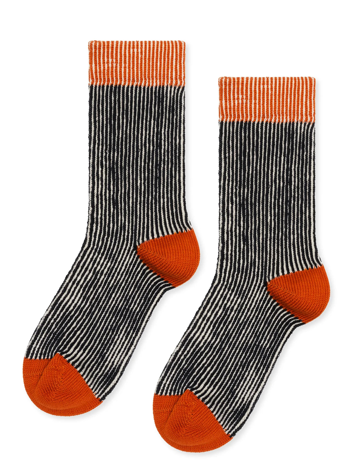 Flat lay of Umbrella Crew socks in Black with cream vertical stripes, orange-striped cuffs, and orange heels and toes.
