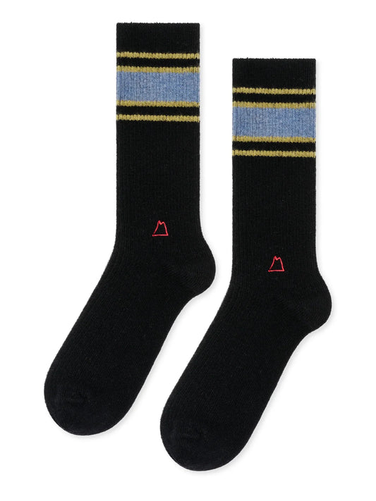 Hansel from Basel Athleisure Rib Cashmere Men's Crew in Black, product flat lay on white background, black ribbed crew sock with blue and gold stripe detail at cuff and small red embroidered triangle logo on lower leg

