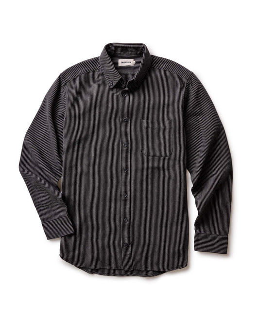 The Jack in Roped Black Indigo by Taylor Stitch, flat lay front view showing full shirt silhouette, button-down collar, chest pocket, and long sleeves